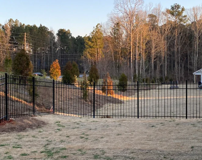 metal fence on a backyard of a house